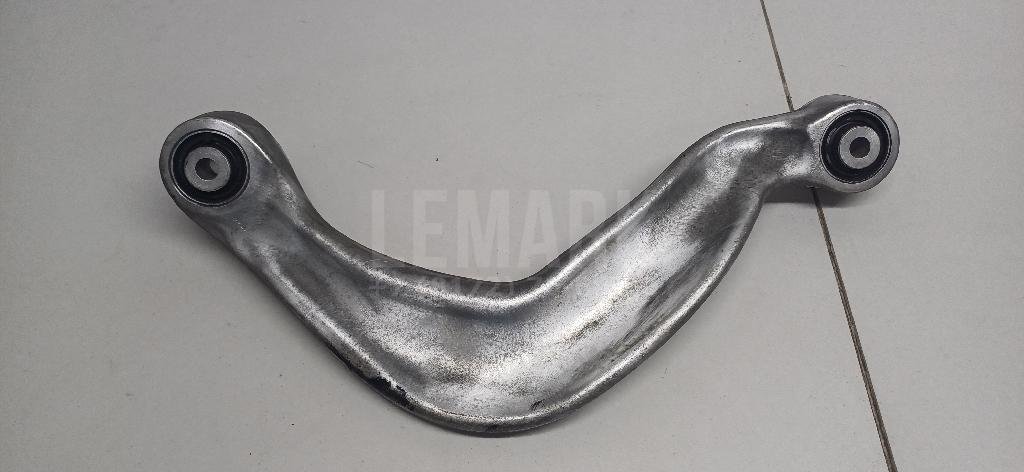 Рычаг задний верхний правый