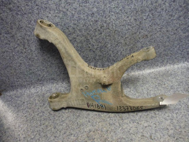 Рычаг задний нижний правый