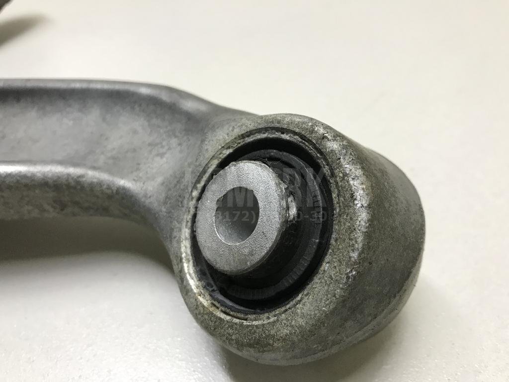 Рычаг задний верхний правый