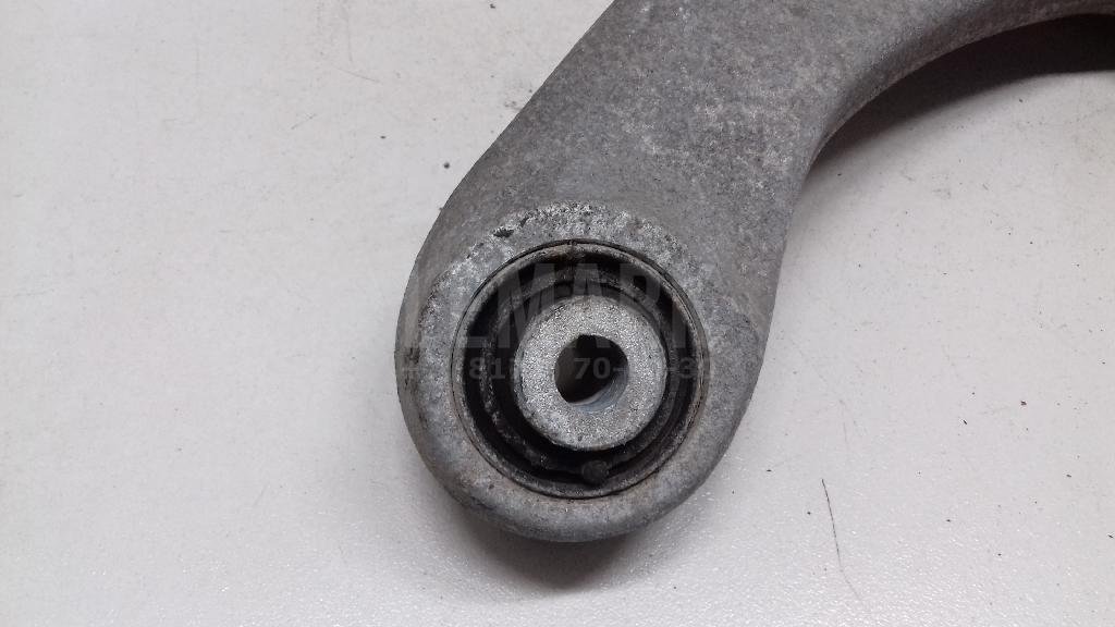 Рычаг задний верхний правый