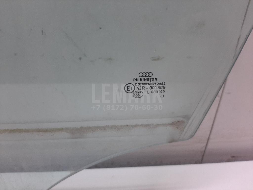Стекло двери передней левой