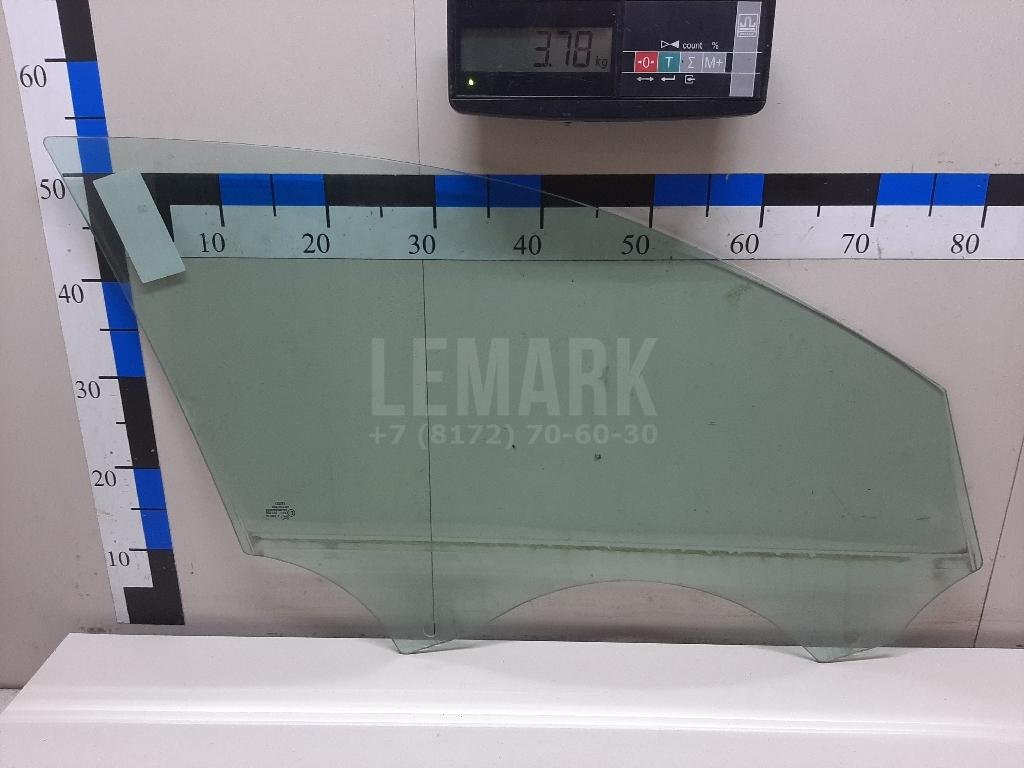 Стекло двери передней левой