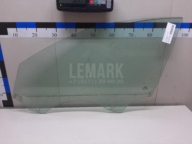 Стекло двери передней левой