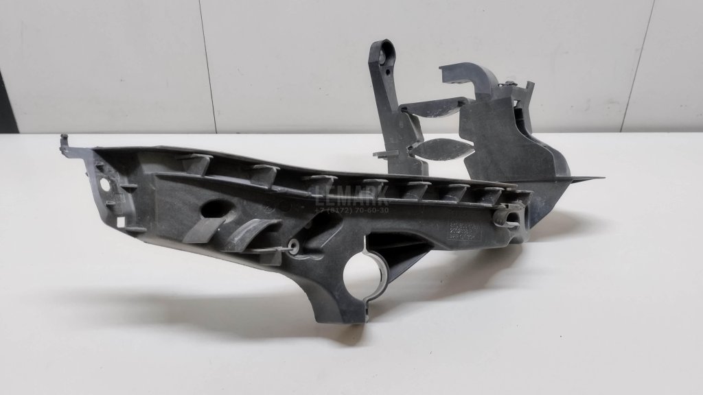 Кронштейн фар правый