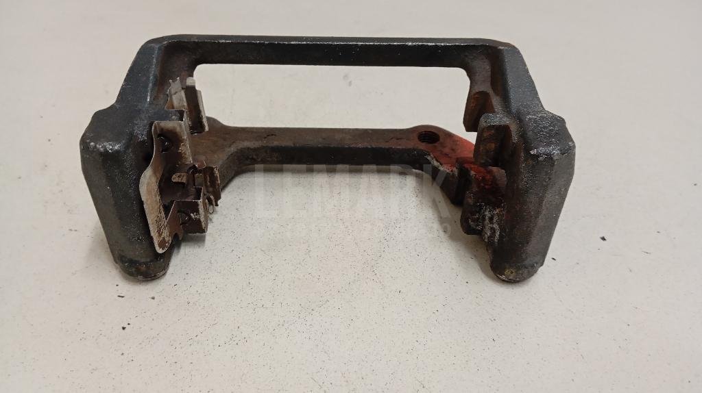 Скоба суппорта заднего левого