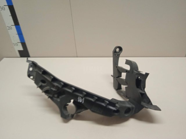 Кронштейн фар правый