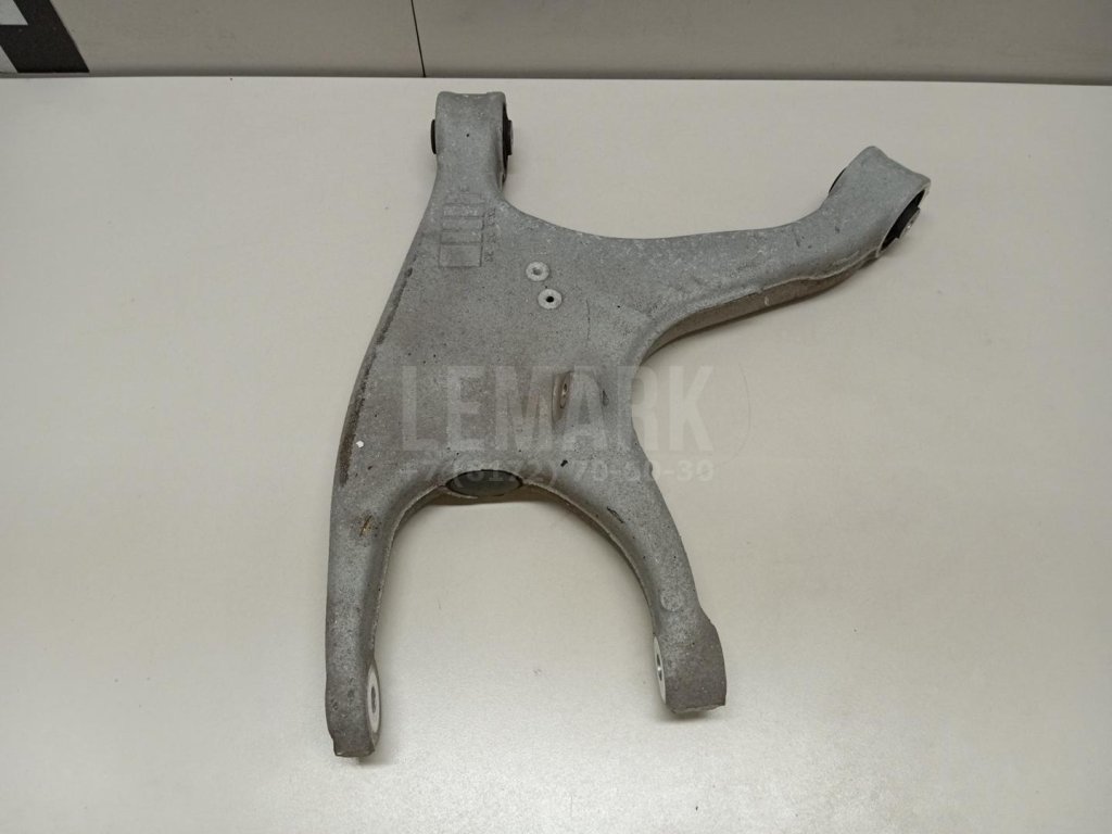 Рычаг задний нижний правый