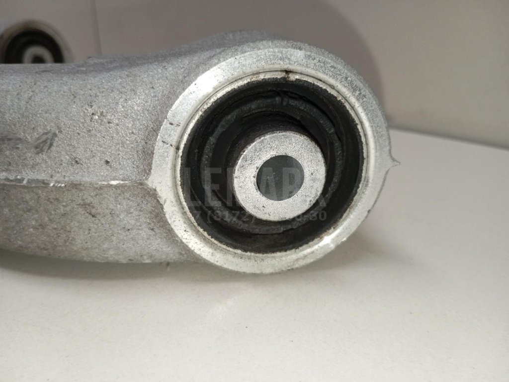 Рычаг задний нижний правый