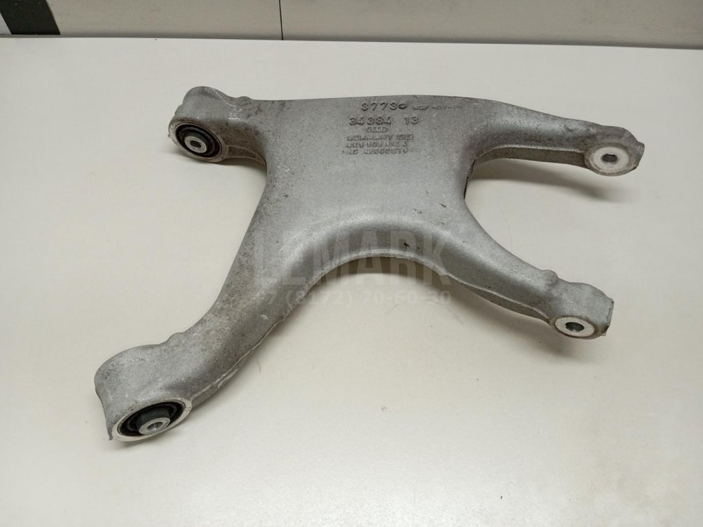 Рычаг задний нижний правый