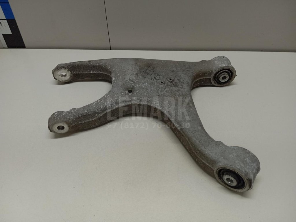 Рычаг задний нижний правый