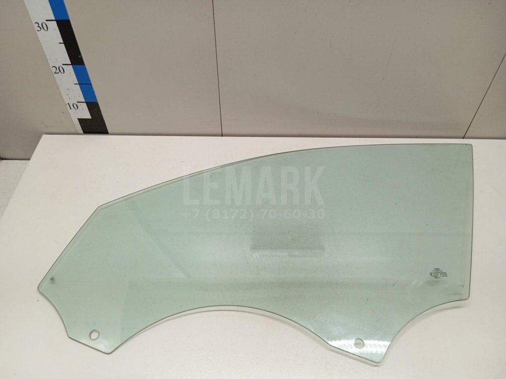 Стекло двери передней левой