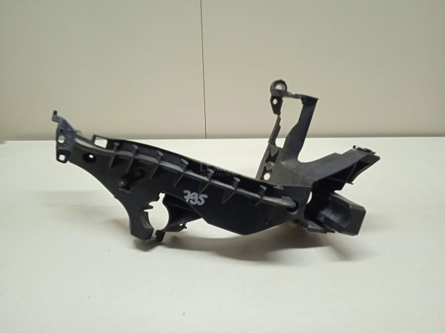 Кронштейн фар правый