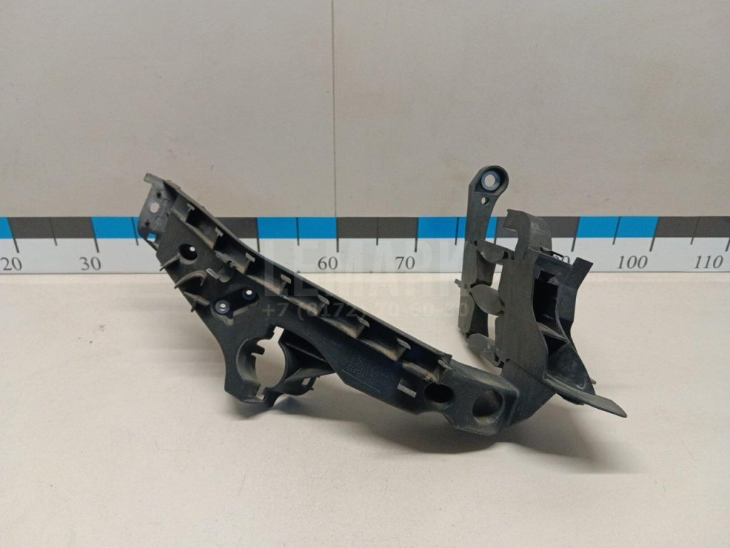 Кронштейн фар правый