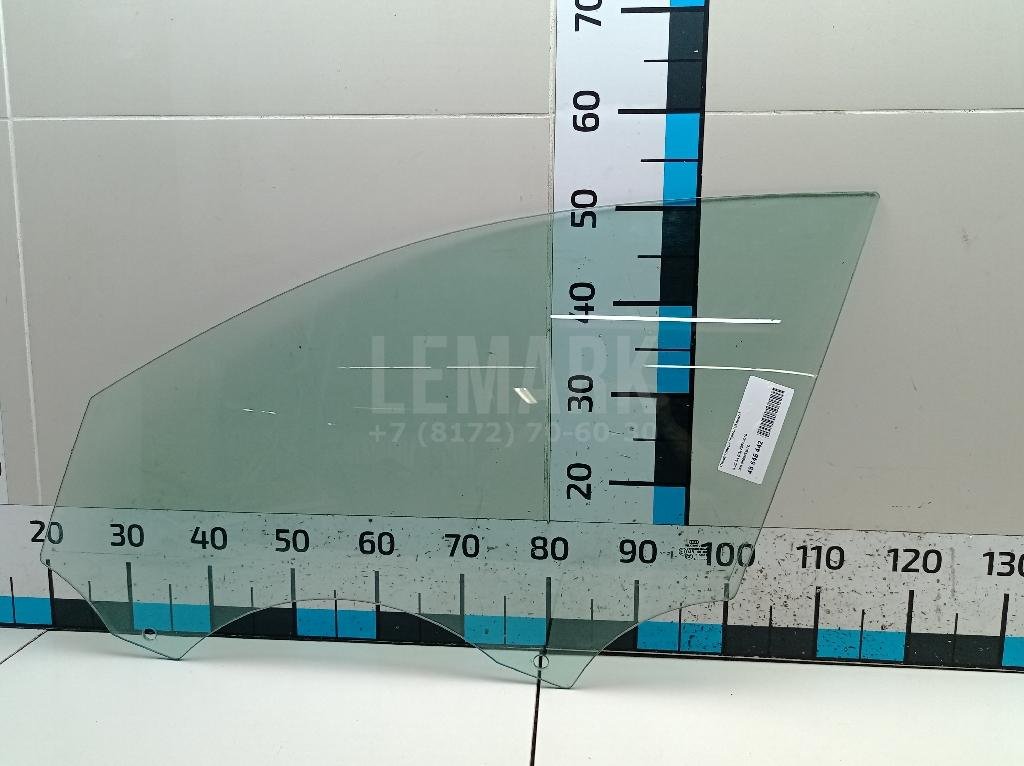 Стекло двери передней левой