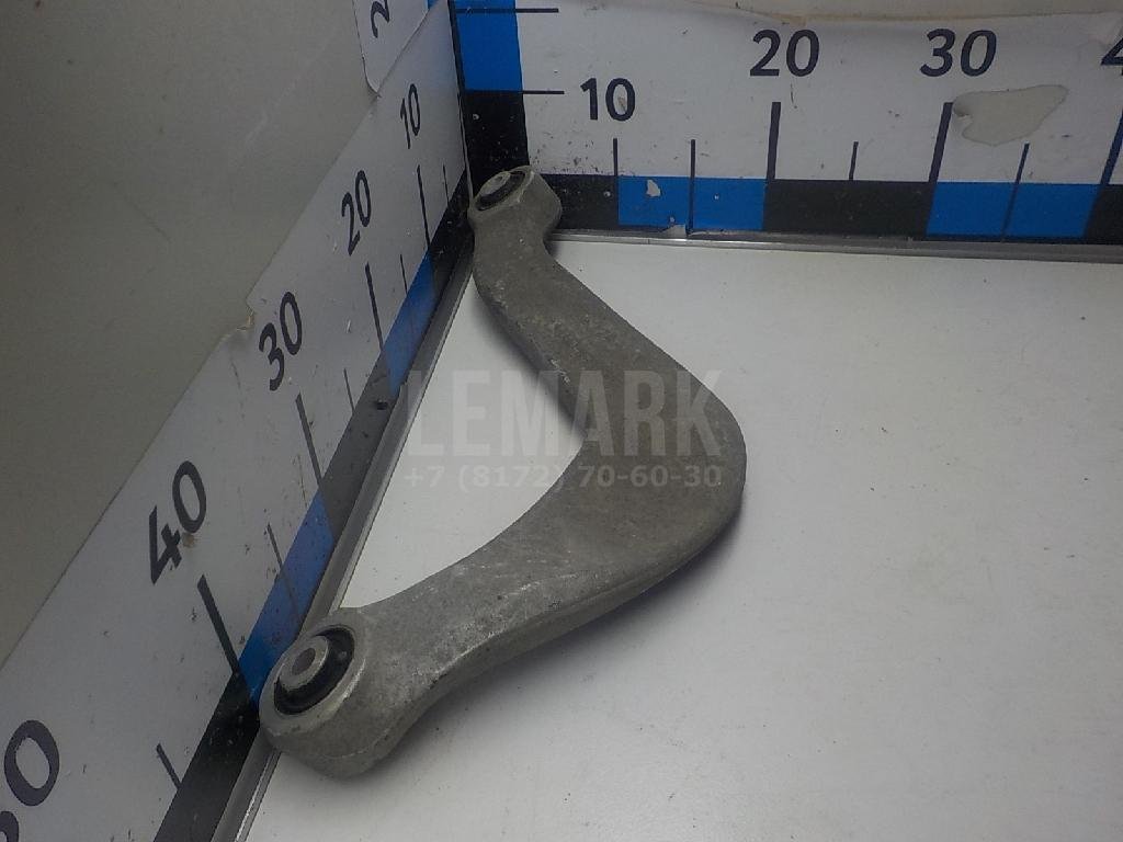 Рычаг задний верхний левый