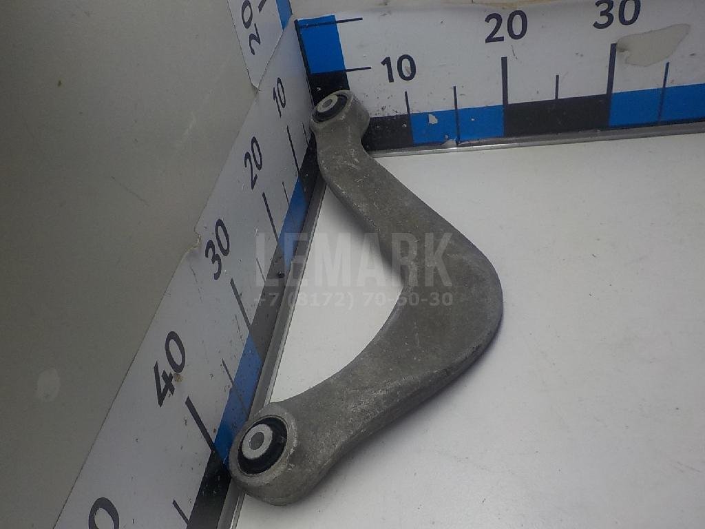 Рычаг задний верхний левый