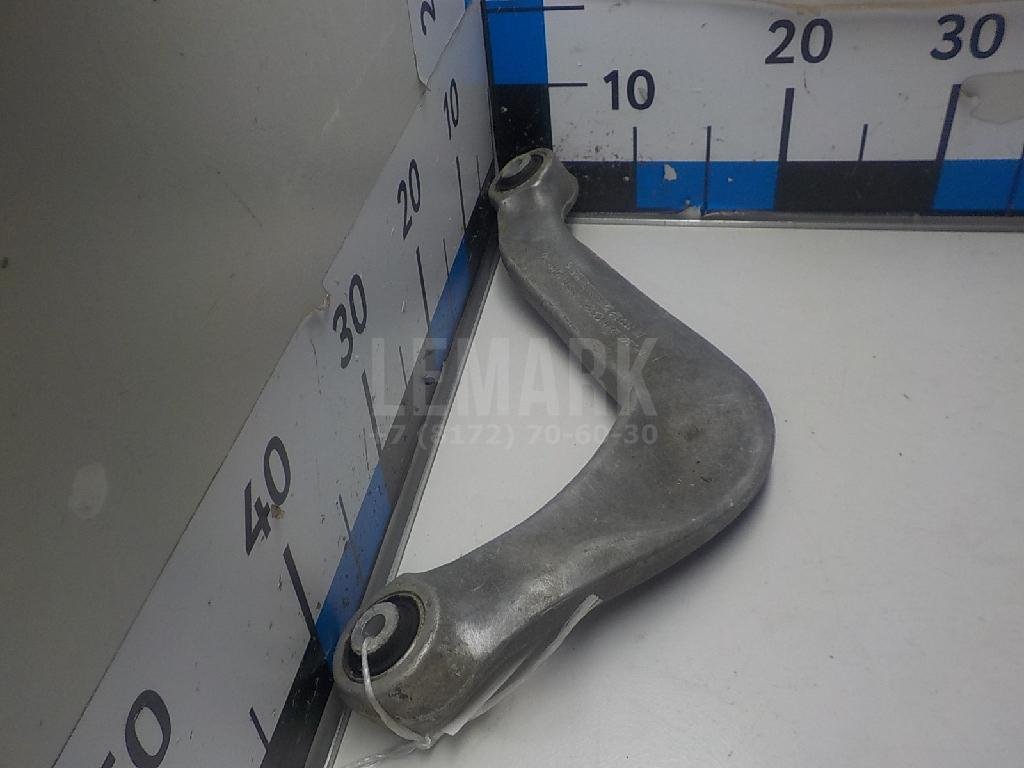 Рычаг задний верхний левый