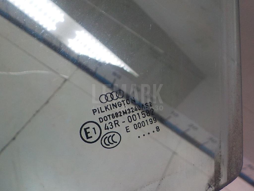 Стекло двери передней левой