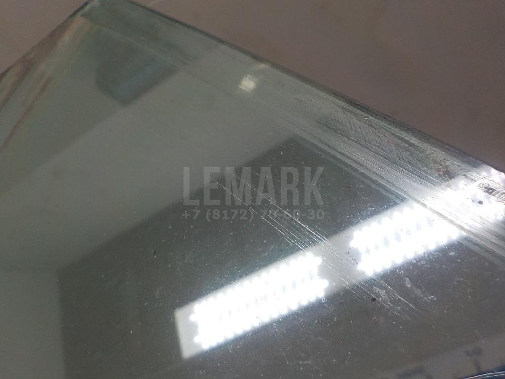 Стекло двери передней левой