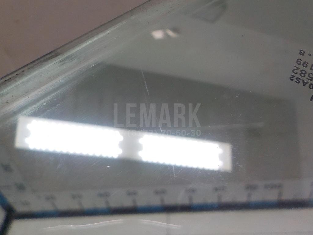 Стекло двери передней левой