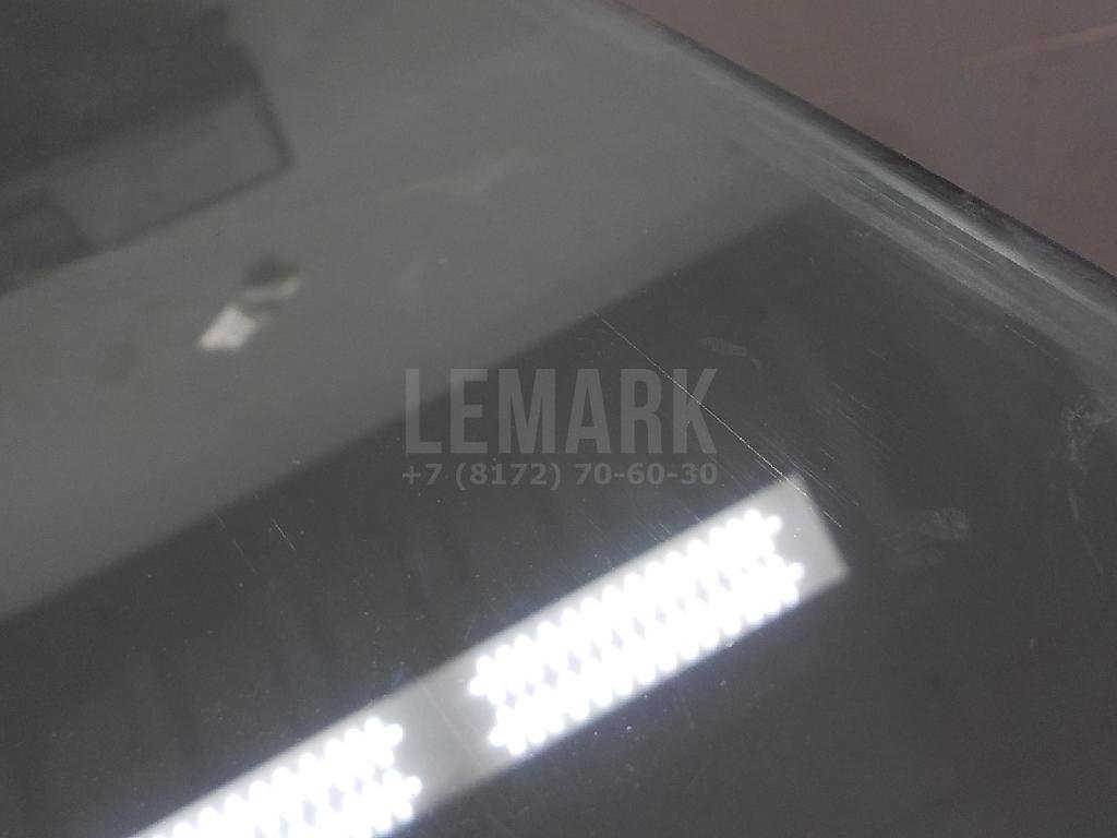 Стекло двери передней левой