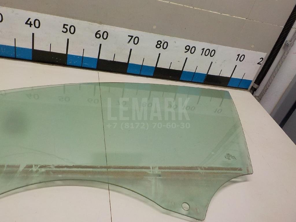 Стекло двери передней левой