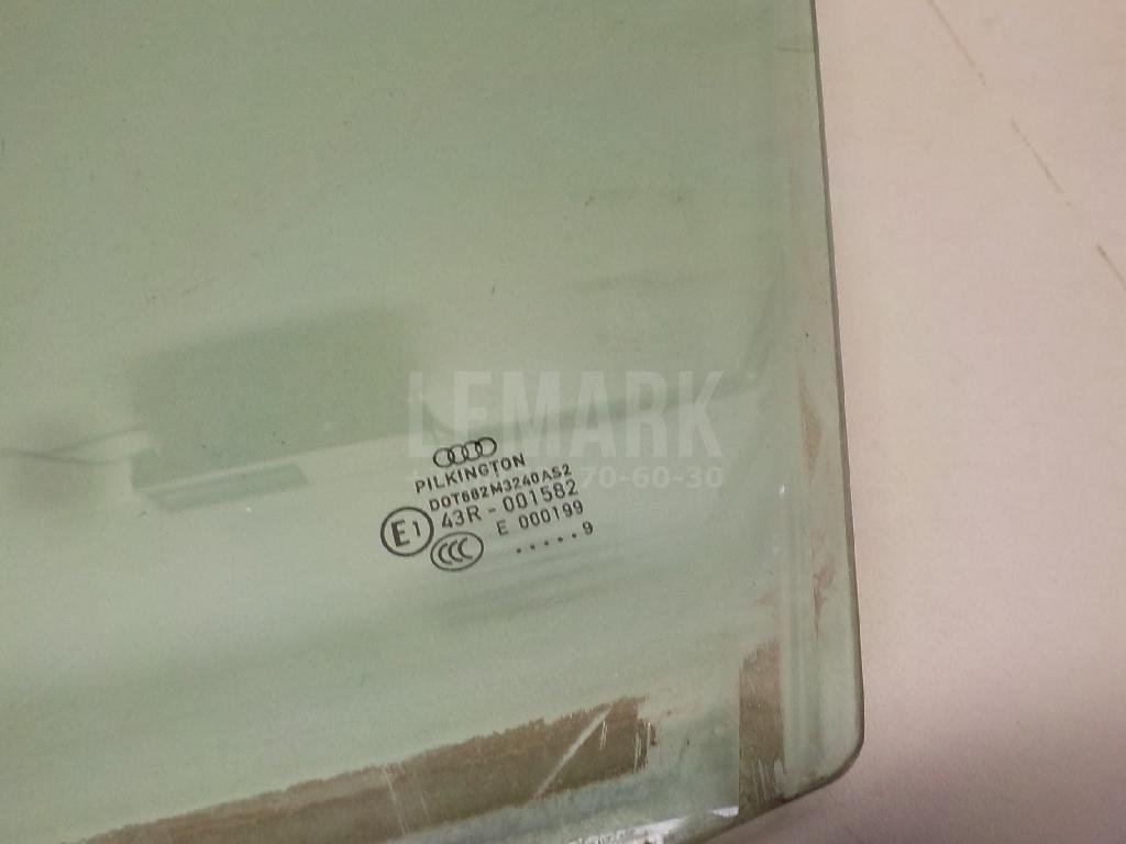 Стекло двери передней левой