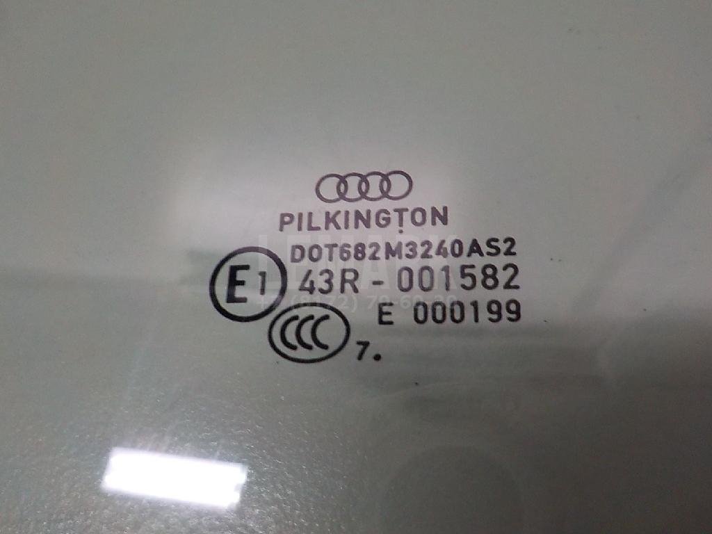 Стекло двери передней левой