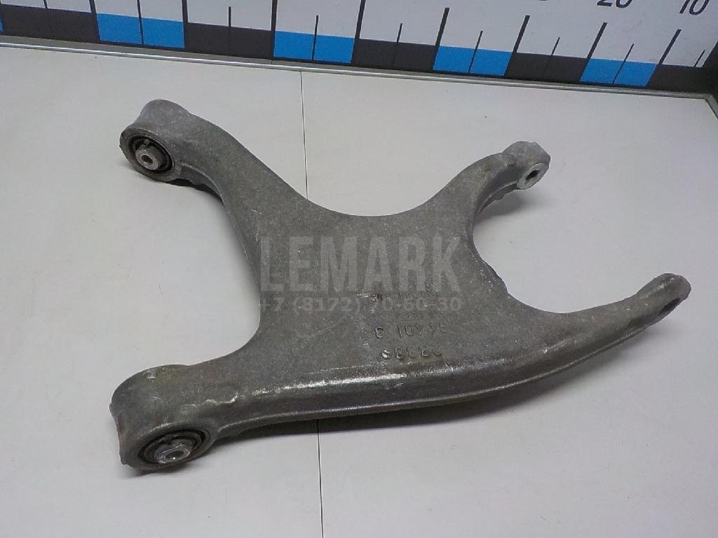 Рычаг задний нижний левый