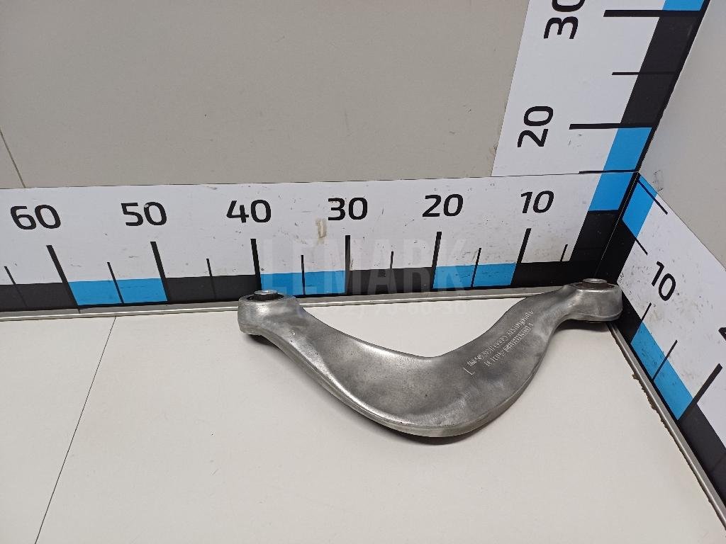 Рычаг задний верхний левый