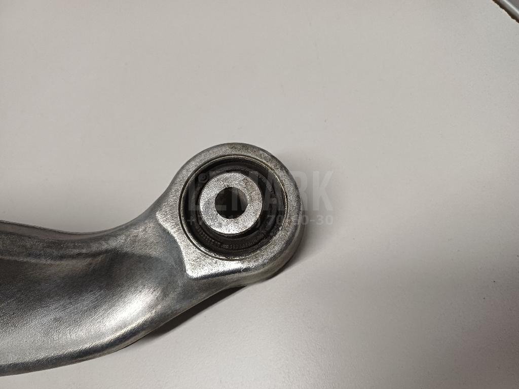 Рычаг задний верхний левый