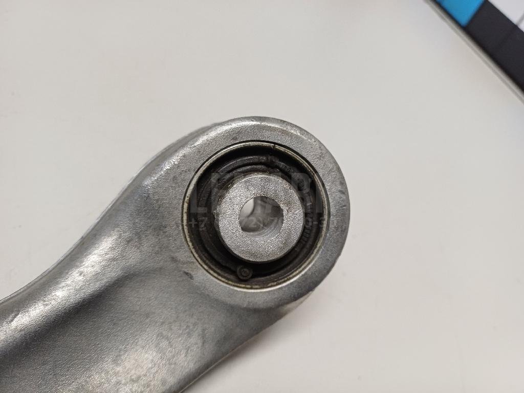 Рычаг задний верхний левый