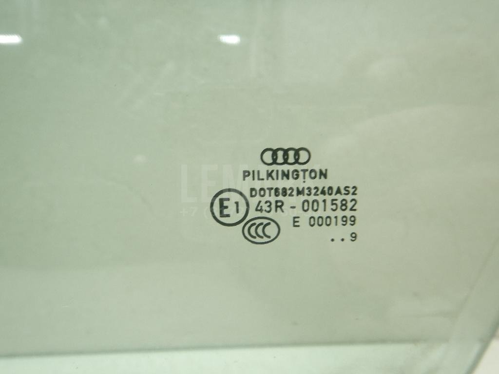 Стекло двери передней левой