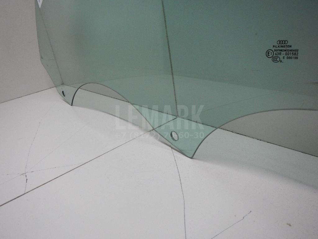Стекло двери передней левой