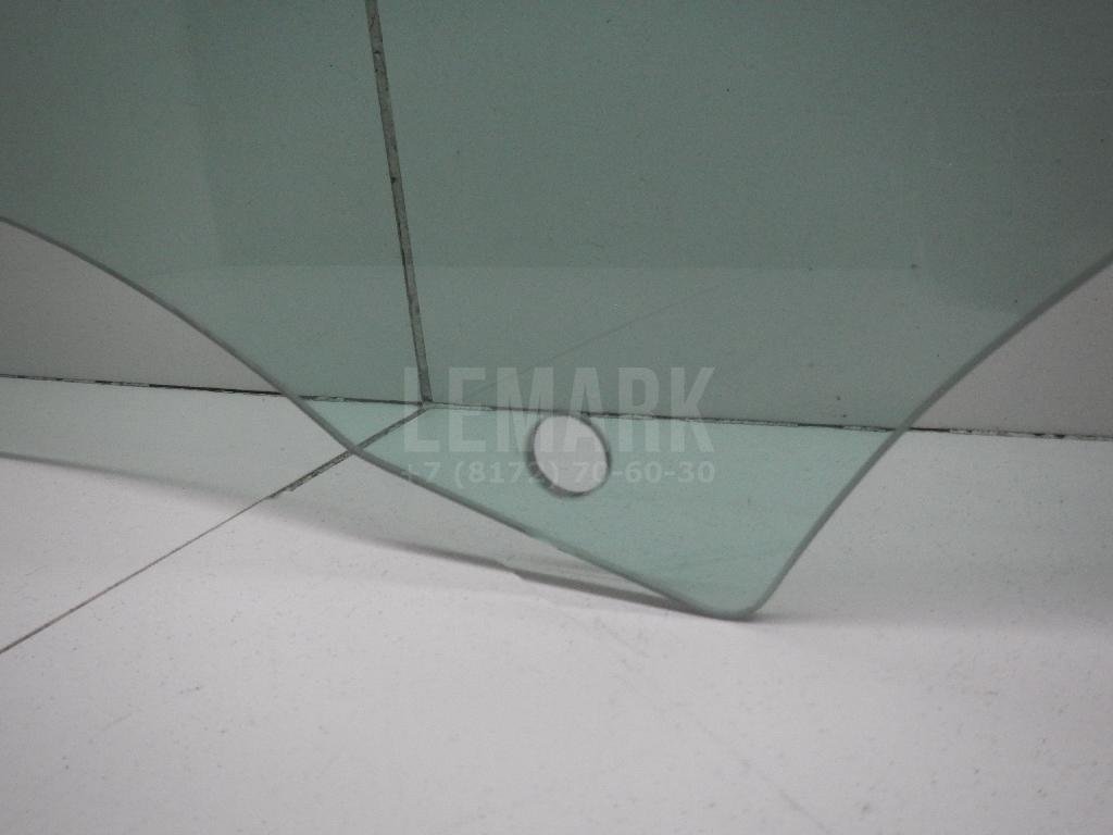 Стекло двери передней левой