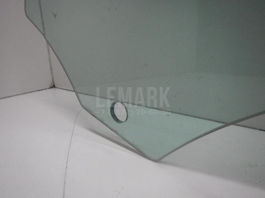 Стекло двери передней левой