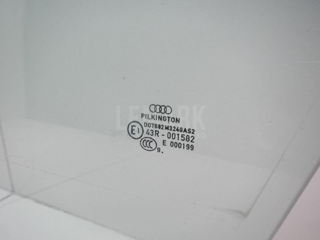Стекло двери передней левой
