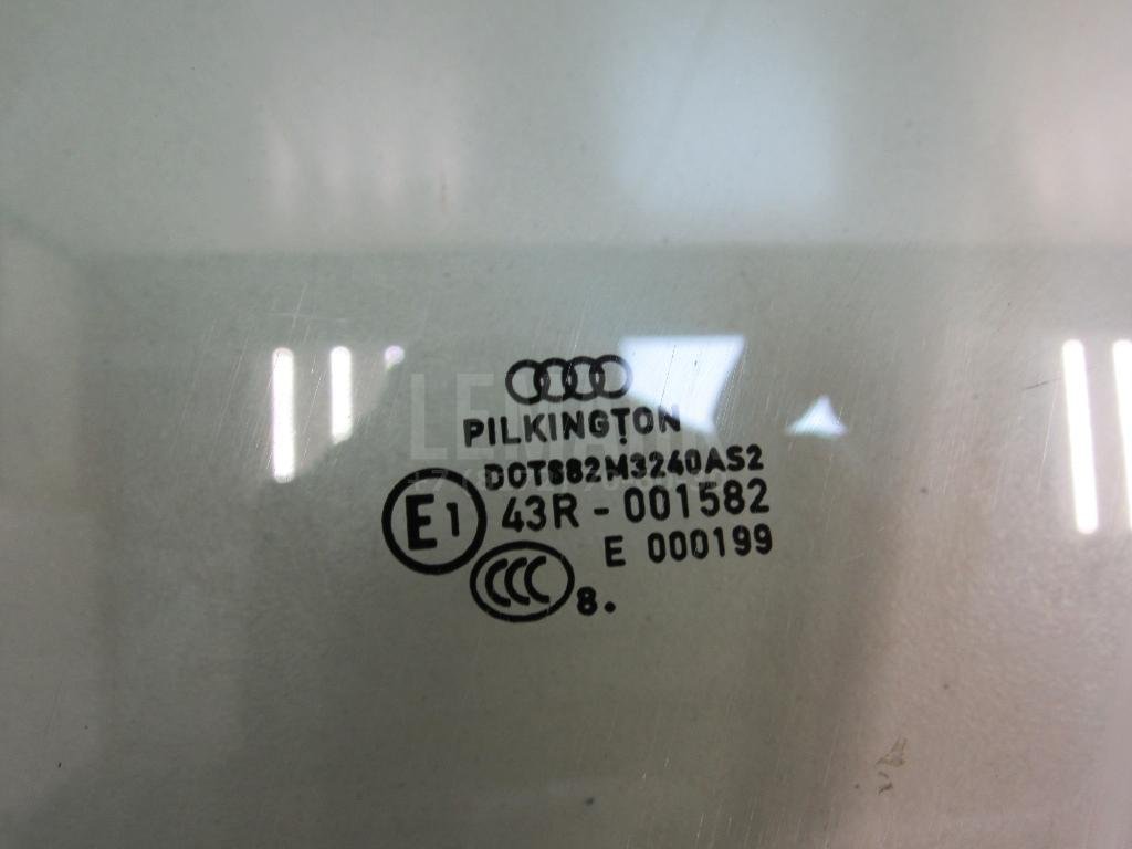 Стекло двери передней левой