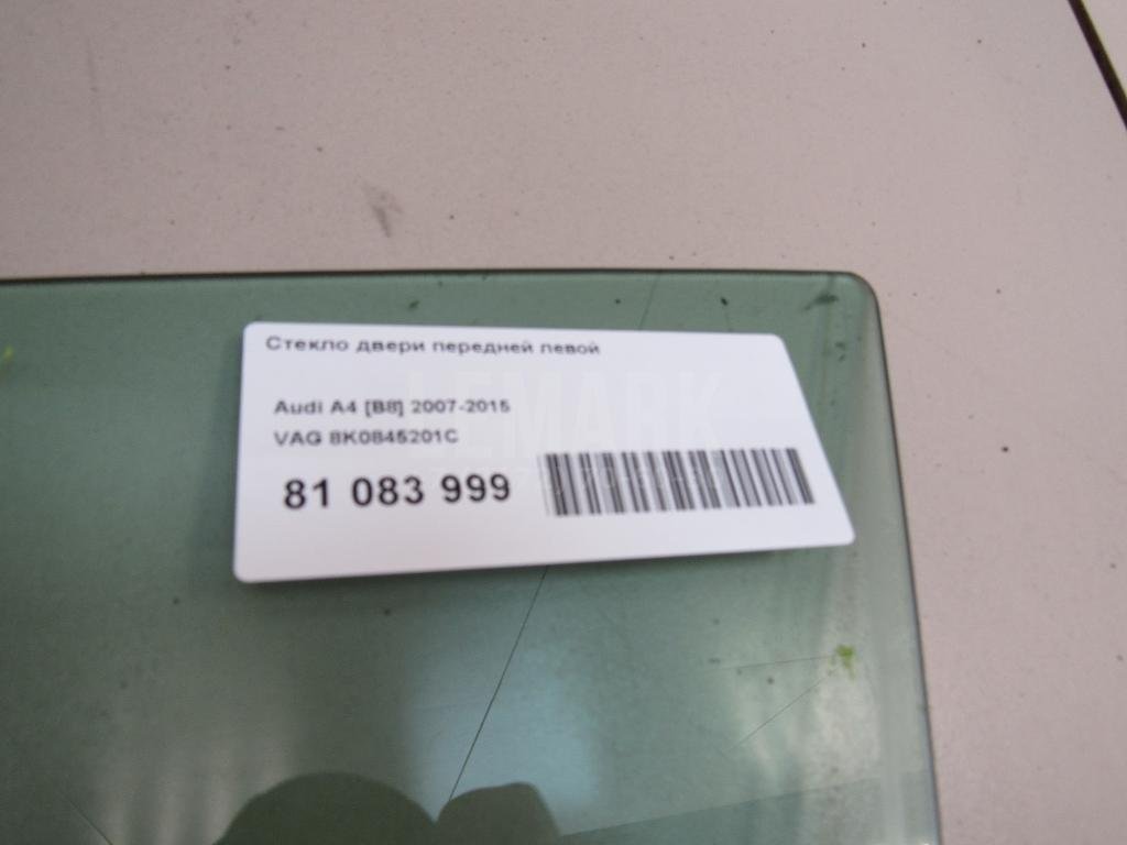 Стекло двери передней левой
