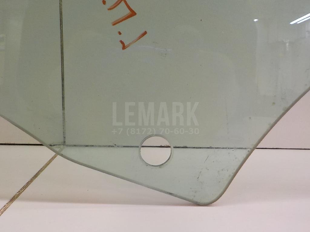 Стекло двери передней левой