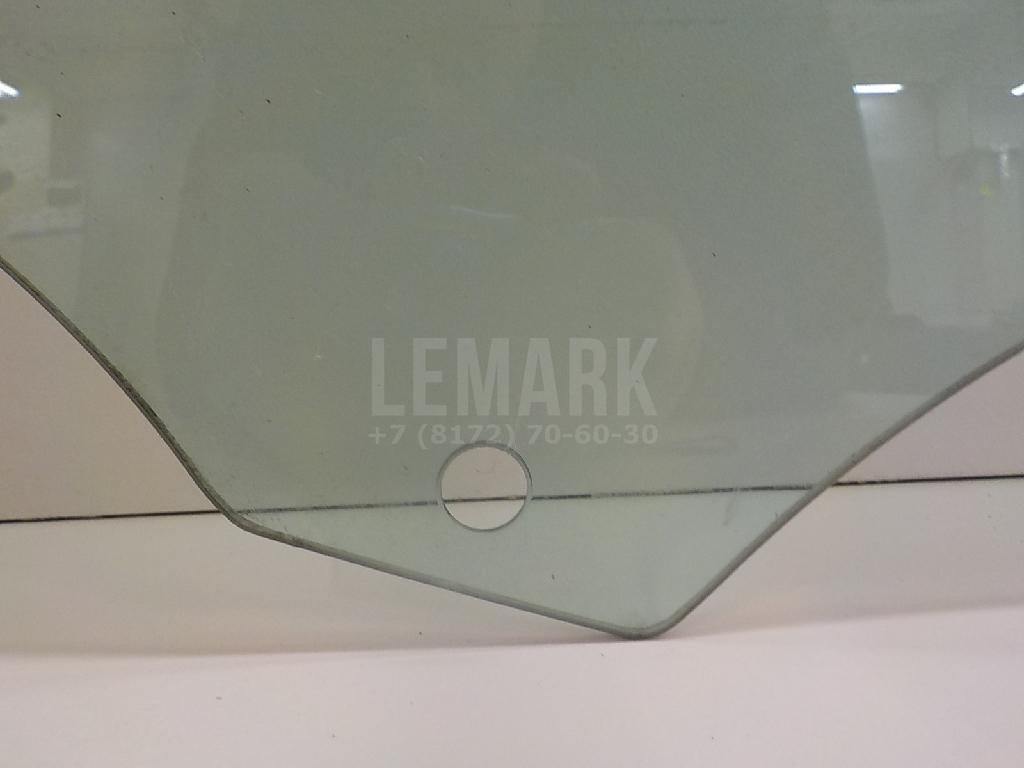 Стекло двери передней левой