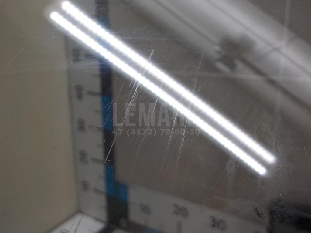 Стекло двери передней левой