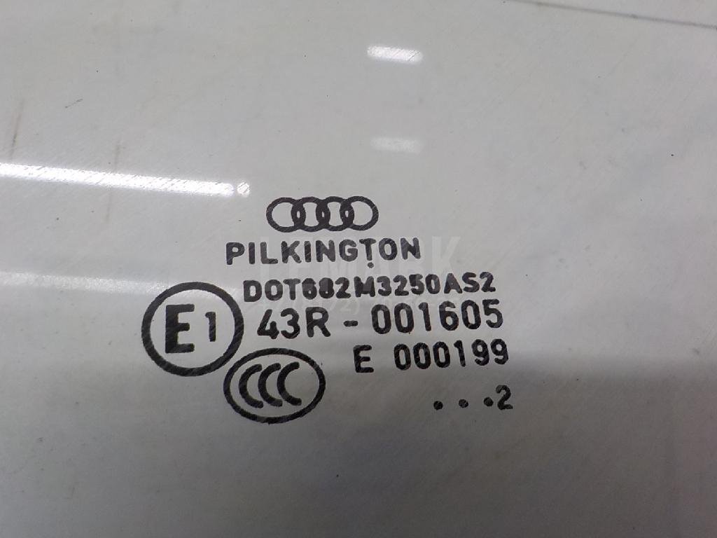 Стекло двери передней левой