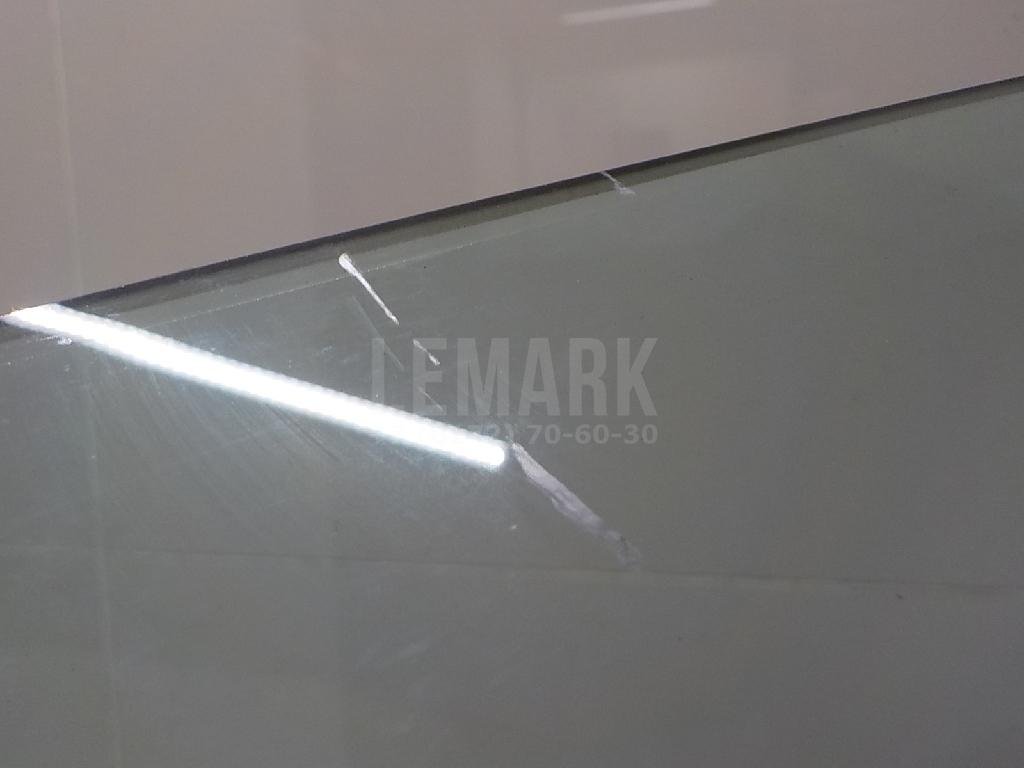 Стекло двери передней левой