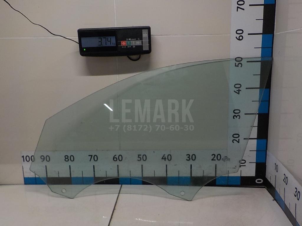 Стекло двери передней левой