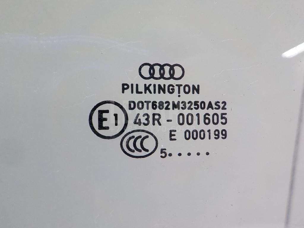 Стекло двери передней левой