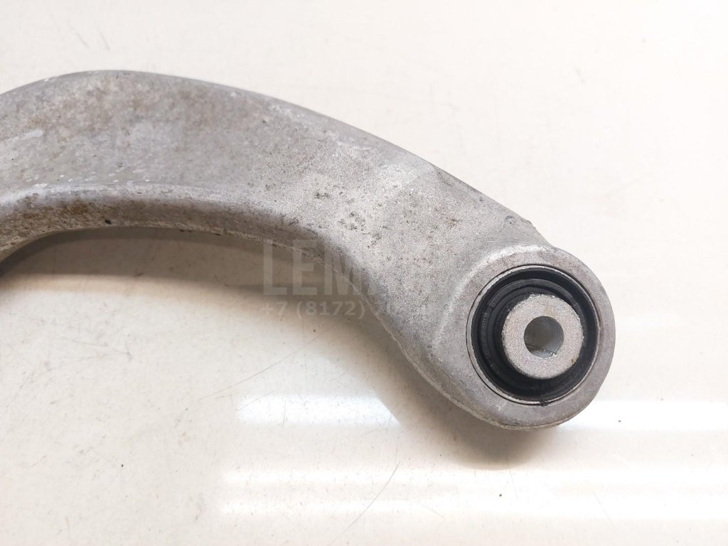 Рычаг задний верхний левый