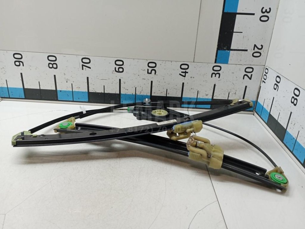 Стеклоподъемник электр. передний левый