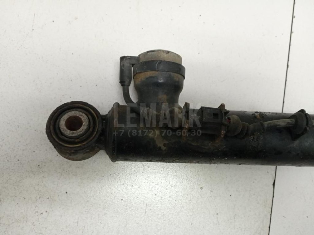 Амортизатор задний левый