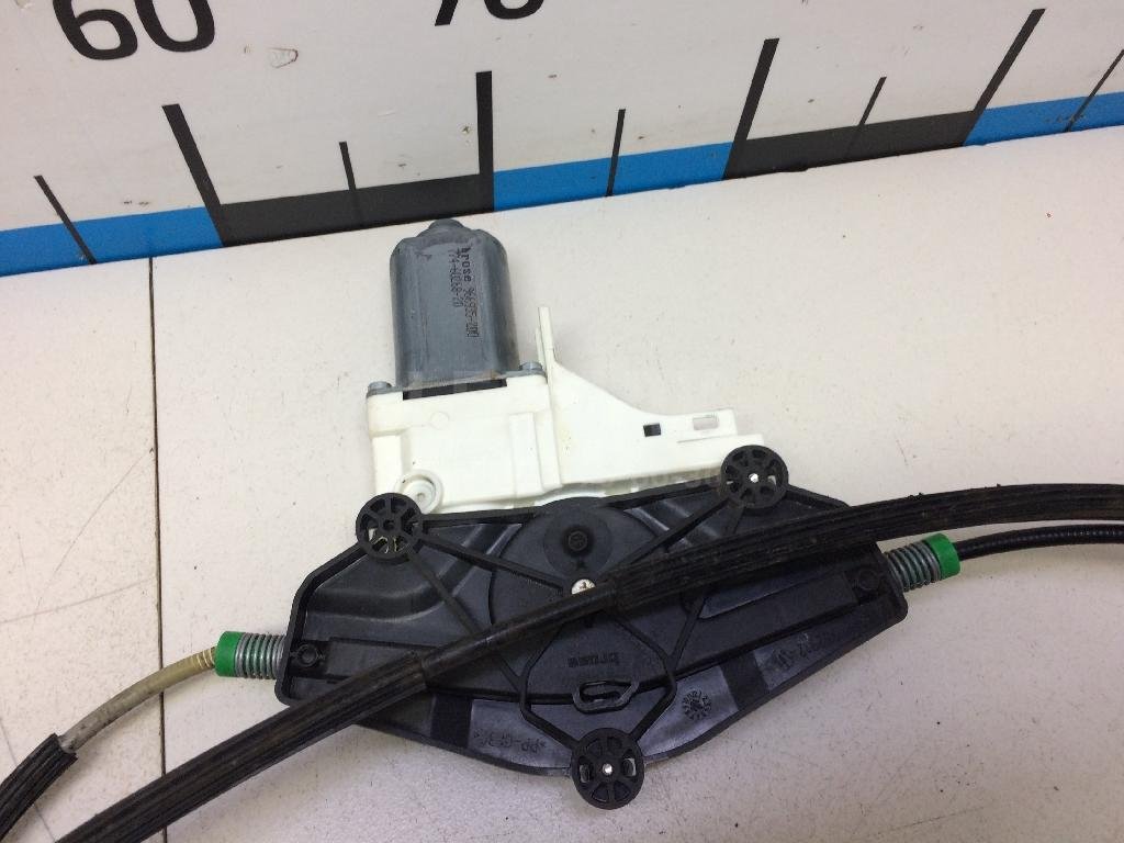 Стеклоподъемник электр. передний левый